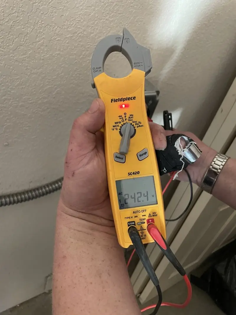 Voltage testing with clamp meter during Generator Installation in San Jose